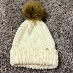 White and gold winter hat